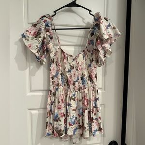 Gimmicks off shoulder floral top